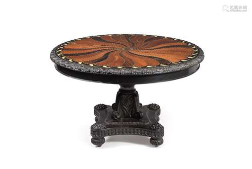 ϒ A Ceylonese ebony and specimen wood inlaid circular centre table