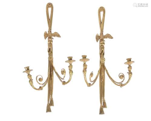 A pair of French gilt bronze twin light wall appliques in Empire taste, early 20th century