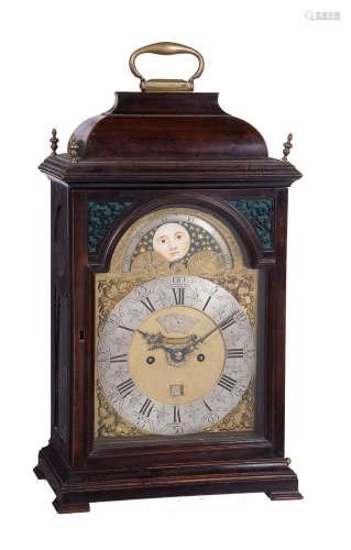 A rare ebonised Dutch striking bracket clock with moonphase and alarm, bearing a signature for Thoma