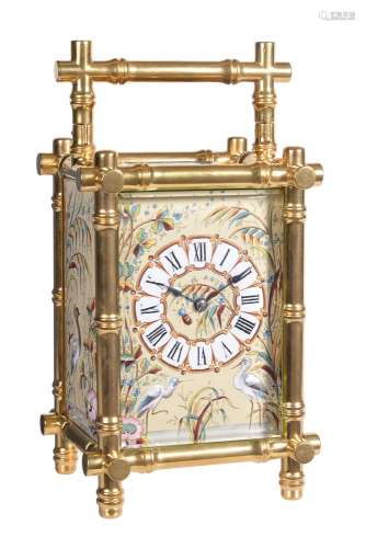 A fine French gilt brass bamboo cased carriage clock with relief enamelled panels and push-button re