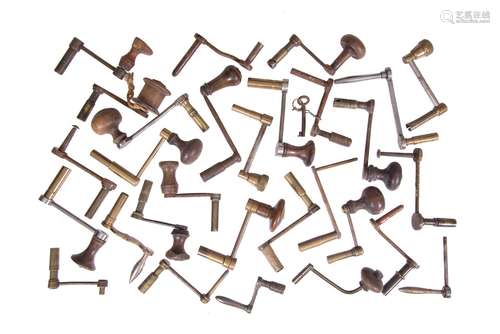 A collection of twenty-eight longcase clock crank keys, anonymous, late 18th century and later