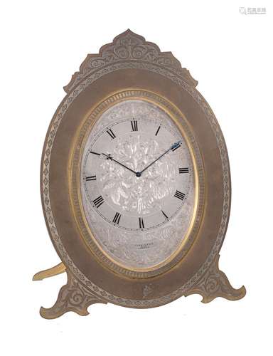 A fine large Victorian engraved gilt brass oval strut timepiece, Thomas Cole for retail by Finnigans