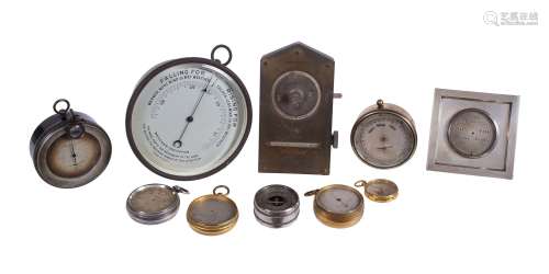 A collection of aneroid barometers and in varying states of repair, various makers, late 19th and ea