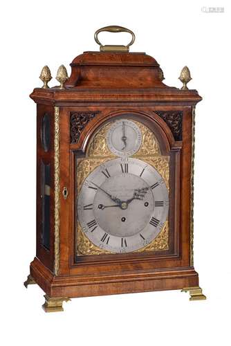 A George III brass mounted mahogany quarter-chiming table clock with concentric calendar, the dial s