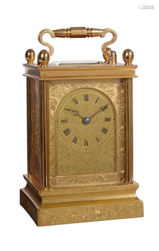 A fine French engraved gilt brass carriage clock in the English taste, unsigned, probably Paris, thi