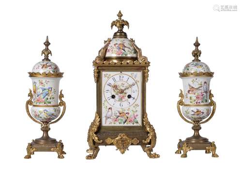 A French gilt brass and painted porcelain mantel clock garniture, Vincenti et Cie, Paris, circa 1875