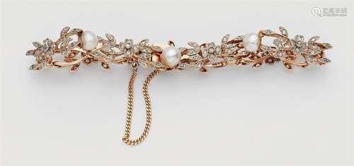 A Belle Epoque Oriental pearl and diamond bracelet14k red gold and platinum bracelet designed as a