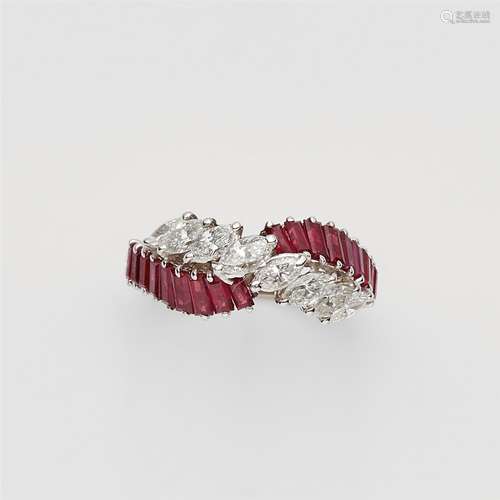 An 18k white gold, ruby and diamond ringCrossover ring set with rows of 18 calibrated baguette-cut