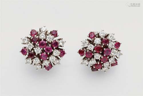 A pair of 18k white gold and ruby earringsDomed stud earrings, each set with 16 brilliant-cut