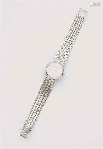 An 18k white gold ladies wristwatchRound case with matte silver dial and silver relief indices and