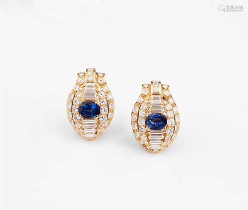 A pair of 18k gold diamond and sapphire cocktail clip earrings18k gold earrings of rounded oval