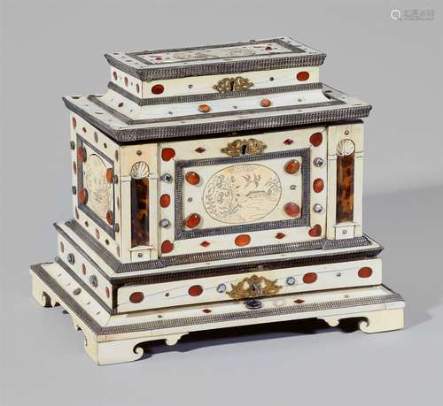 A magnificent Augsburg carved ivory cofferIvory, tortoiseshell, ebony, and burr walnut veneers on