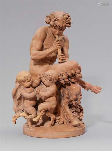 A terracotta group with a faun playing the fluteThree-figure group on a round plinth depicting a