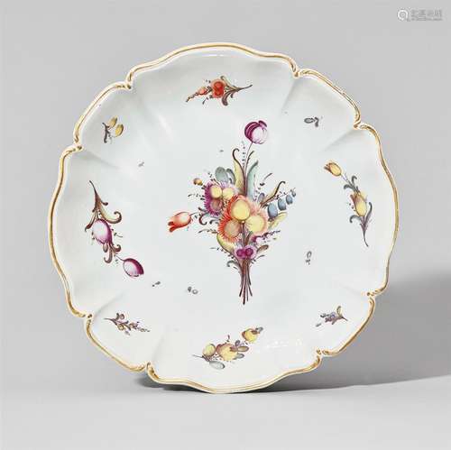 A Nymphenburg porcelain compote dish with stylised flowersRound, scalloped form. Impressed rhombus