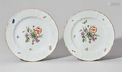 Two Nymphenburg porcelain plates with flowers and hazelnutsAlt-Brandenstein model. The well