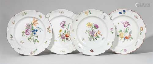 Four Nymphenburg porcelain plates with bouquetsScalloped plate with scattered flowers. Impressed