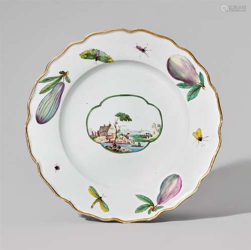 A Nymphenburg porcelain plate with a landscape and figsScalloped plate with a moulded rim. Decorated