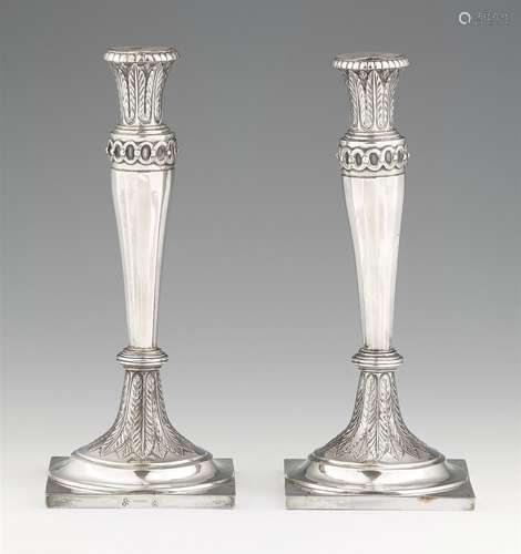 A pair of Weißenfels silver candlesticksSilver. Square bases with lancet décor supporting tapering