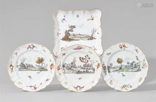 A Nymphenburg porcelain dish and three plates with green landscapesAngular dish and shallow plates