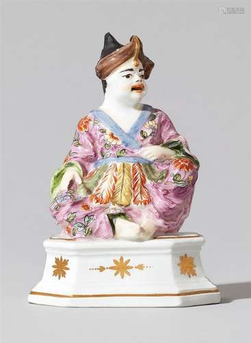 A rare Meissen porcelain figure of a seated male pagodeIncense burner with hollow base designed as a