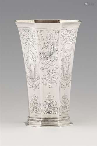 A large Hamburg silver beakerSilver. Tapering beaker of octagonal section decorated throughout