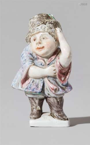 A rare Italian porcelain figure of a dwarfStanding figure of a small hunch-backed man on a flat