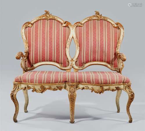 A canapé and armchair suiteWhite and gilt softwood with replaced silk covers over upholstery.