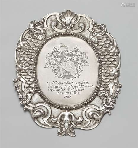 A Sinzig silver official shieldSilver. Oval cartouche form shield with chased règence décor to the