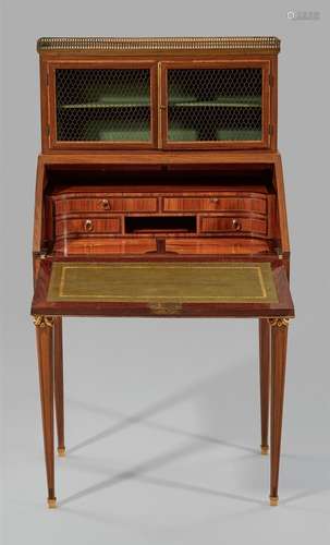 A Parisian inlaid bonheur du jour deskRosewood, palisander, mahogany, and boxwood veneers on oak and