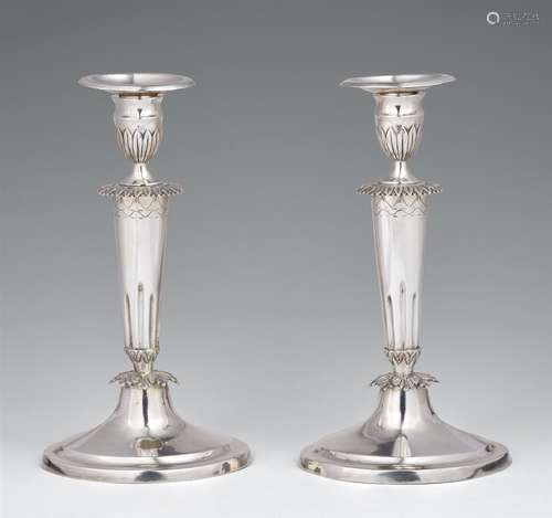 A pair of Mainz silver candlesticksSilver. Tapering column shafts resting on oval bases. Stamps: