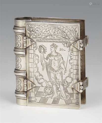 A silver travel clock formed as a bookSilver clock with remnants of gilding designed as a book