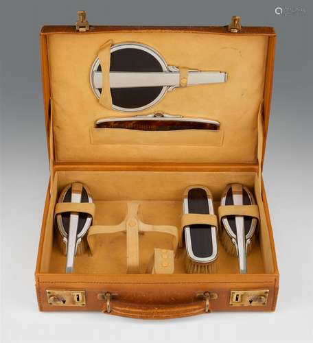 A Copenhagen Art Deco silver vanity set by Georg JensenSilver and ebony set comprising a hand