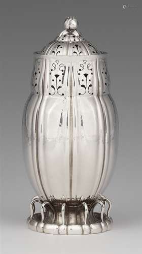 A silver sugar caster by Georg Jensen, model no. 4Slightly squat, fluted corpus on a round moulded