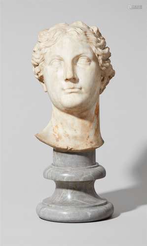 An Italian androgynous white marble bustBust carved in the round in the manner of an ancient Roman