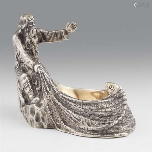 A Moscow silver saltFinely chased salt depicting a motif from Pushkin's “Tale of the Fisherman and