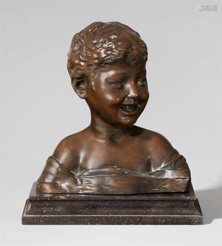 A bronze model of a laughing boyLife-sized cast bronze model of a boy with chocolate brown patina on