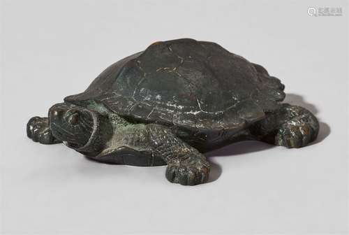 A bronze model of a tortoiseNaturalistic sculpture with dark brown greenish patina. Signed BARYE,