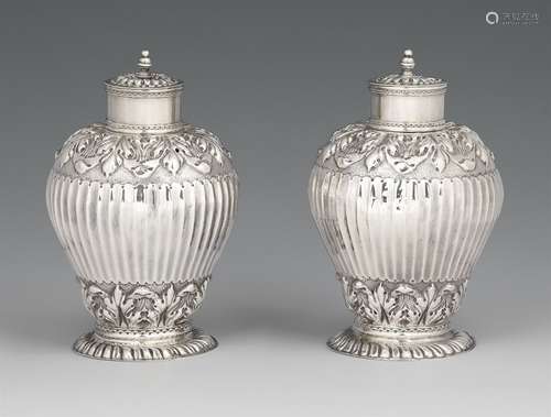 A pair of Haarlem silver tea caddysPear-form vessels with palmette decor on gadrooned bases. Each