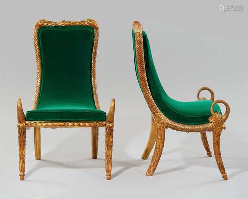 A rare pair of gondola chairs with zoomorphic decorGold painted wood, upholstery with modern green