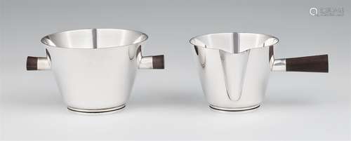 A silver cream set by Georg Jensen, model no. 771Comprising a sugar dish and milk jug of tapering