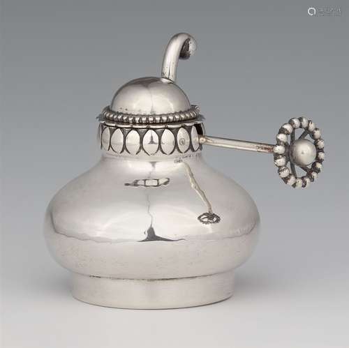 A silver burner for rechaud model no. 88 by Georg JensenPear-form body with domed hinged lid, a