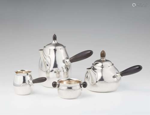 A Copenhagen silver service, no. 80Comprising a coffee pot, teapot, sugar bowl, and milk jug. H of