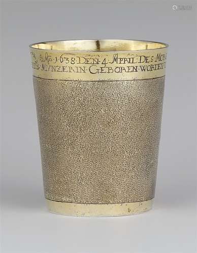 A rare Memmingen silver christening beakerCylindrical silver-gilt beaker with snakeskin pattern