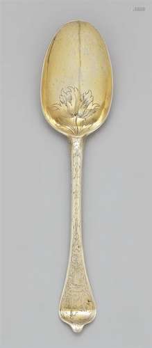 A silver wedding spoonA silver gilt spoon with finely chased acanthus décor, the terminal with a