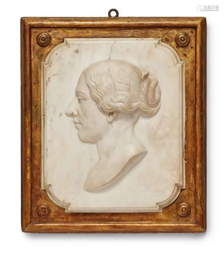 A marble relief plaque with the head of a womanWhite marble on gilt stuccoed wood. Depicting a woman