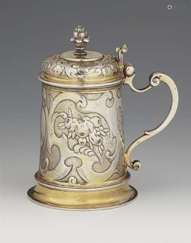 A small Augsburg silver tankardSilver; gold-plated. A silver-gilt tankard of tapering cylindrical