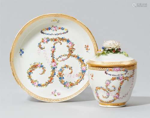 A Nymphenburg porcelain cup and cover monogrammed JRPorzellan, polychromer Emaildekor, Vergoldung.