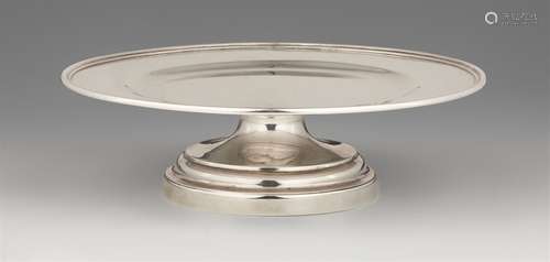 A George III silver tazzaRound platter with a broad rim on a waisted support. H 6; diameter 20.5 cm,