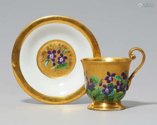 A Meissen porcelain cup and saucer with forget-me-notsBell-shaped cup with original saucer,