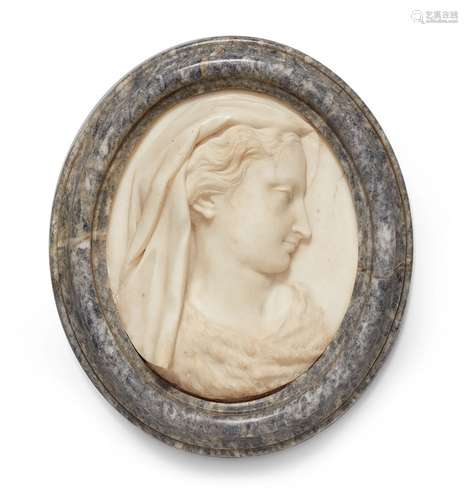 A marble relief plaque of a young woman as an allegory of winterWhite marble oval plaque with a bust